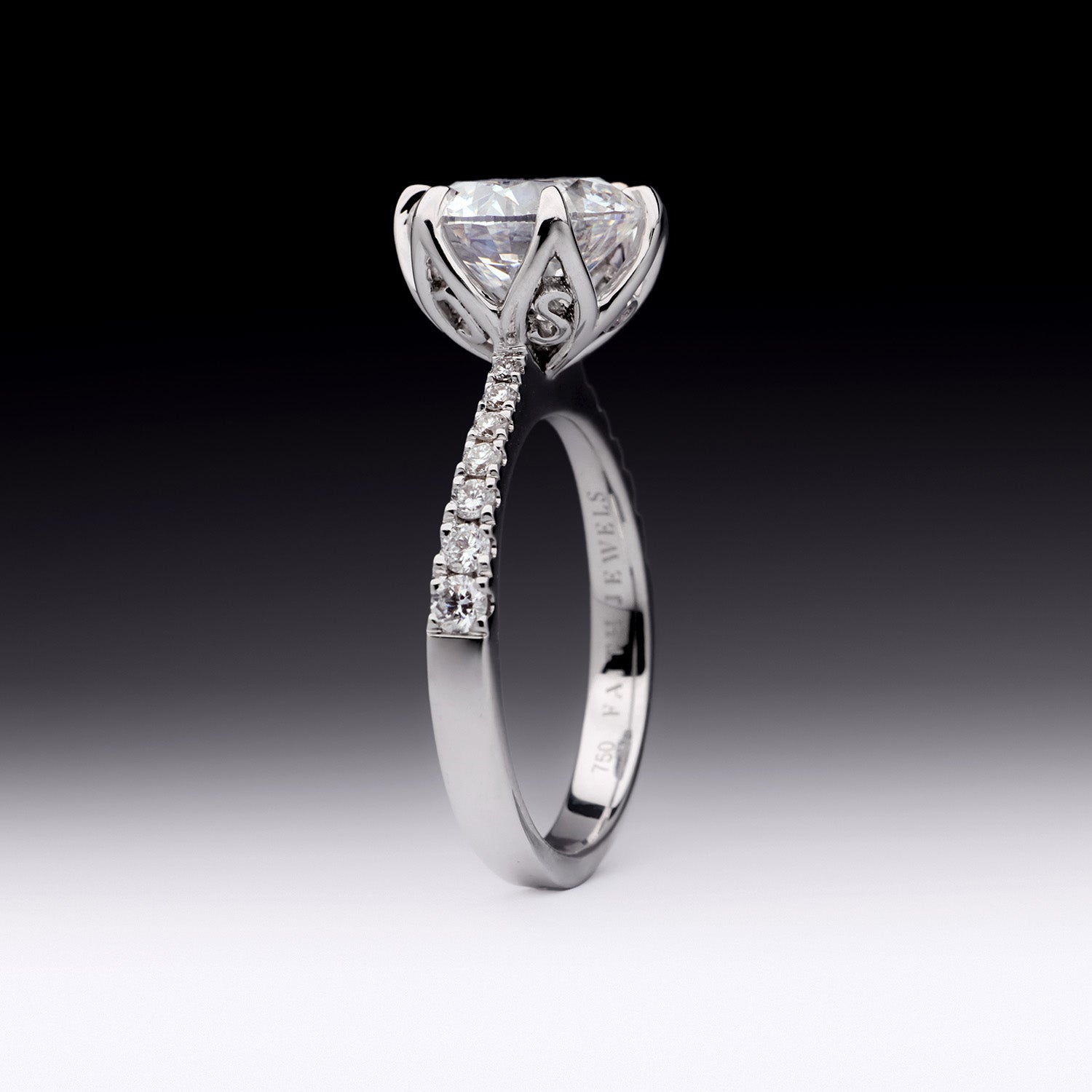 Sylvia diamond engagement ring with round brilliant-cut center stone and pavé band in white gold by Faith Jewels
