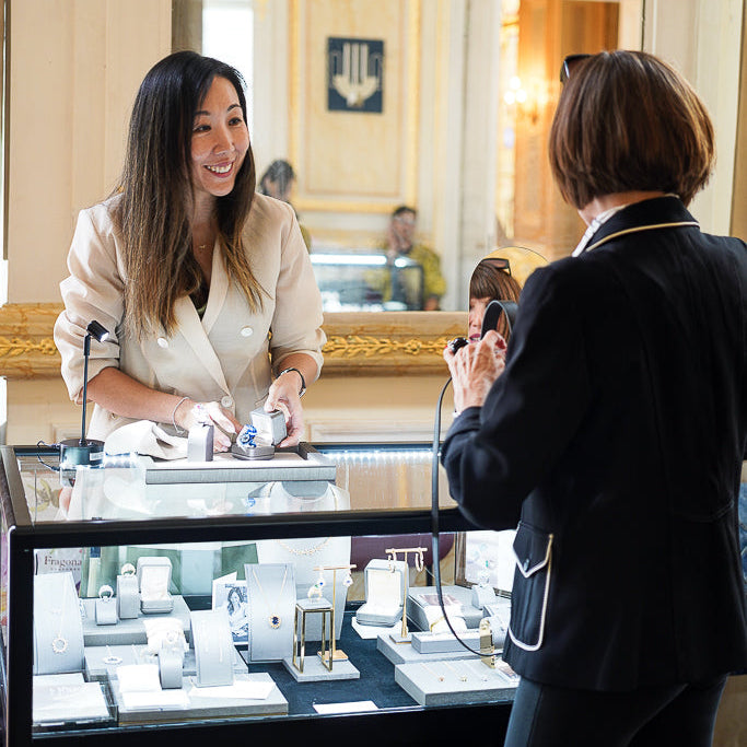 Faith in a Paris jewellery gallery with displayed jewellery.