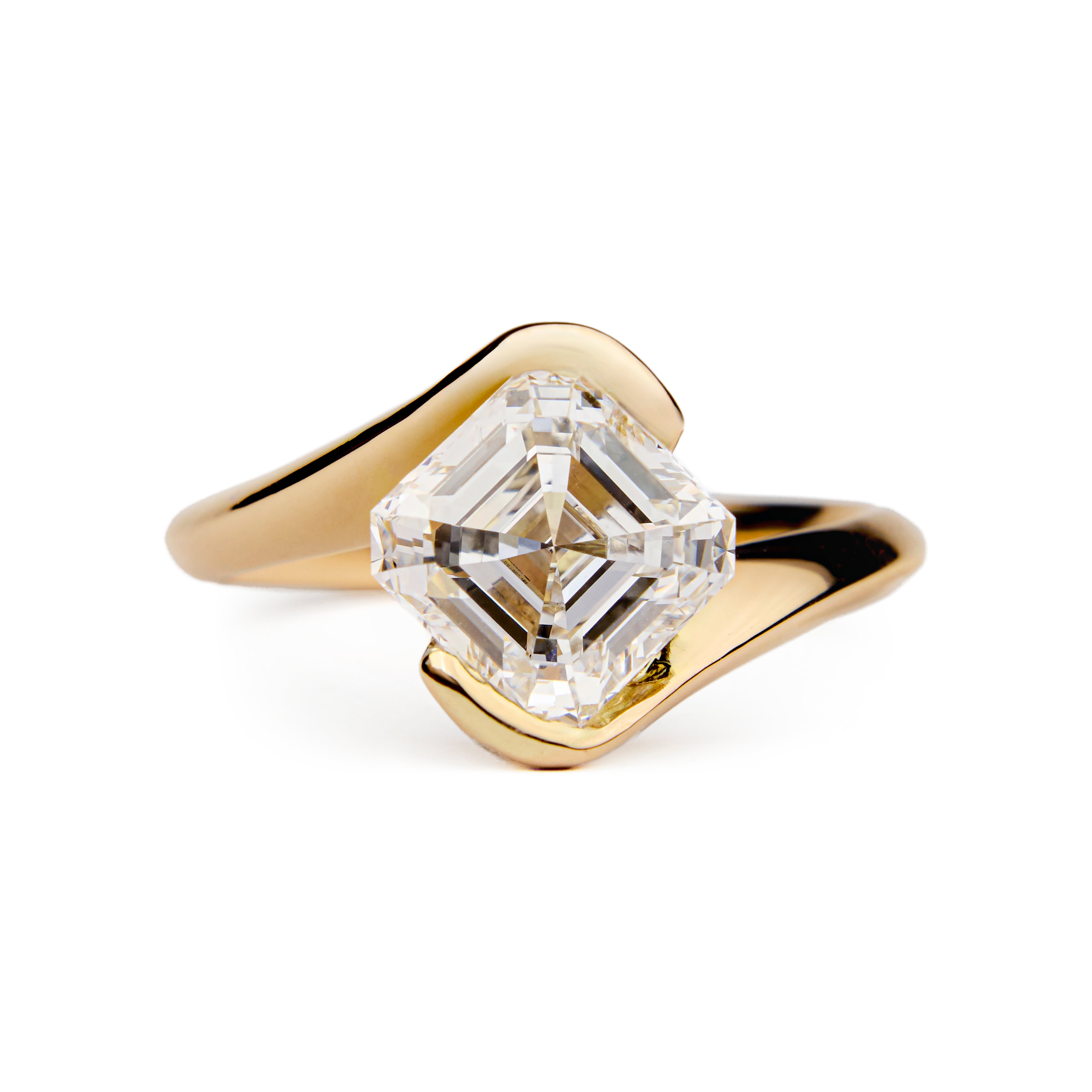 Engagement ring with asscher-cut diamond in yellow gold bypass setting