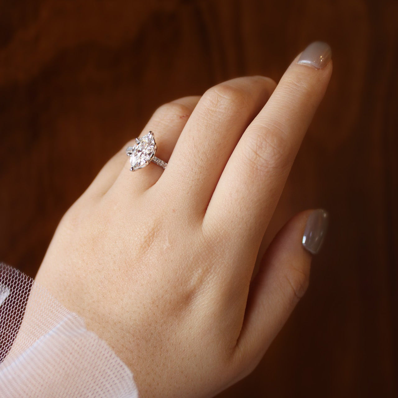 White gold bespoke marquise Toi et Moi engagement ring featuring 2ct centre diamond and precision-crafted reverse diamond.