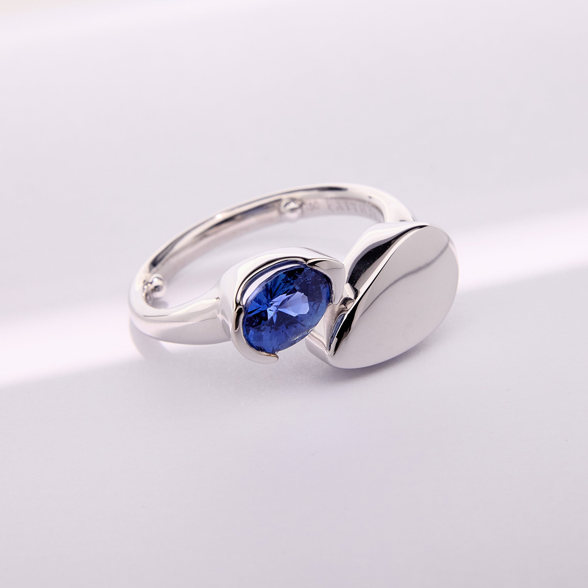 Moderna Blue Sapphire Ring in 18k white gold featuring a vivid teardrop blue sapphire, sculptural tapered band and bold modern design.