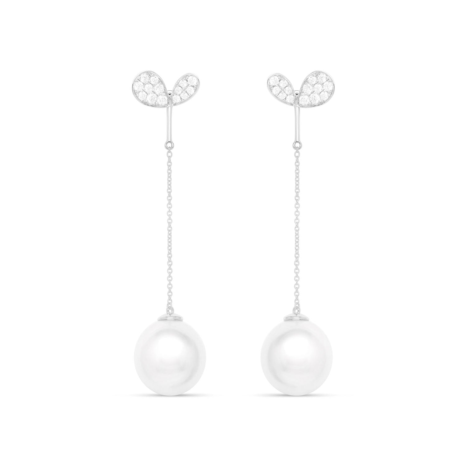 Faith Jewels south Sea pearl drop enhancers on delicate 18k white gold chains, paired with stud earrings.