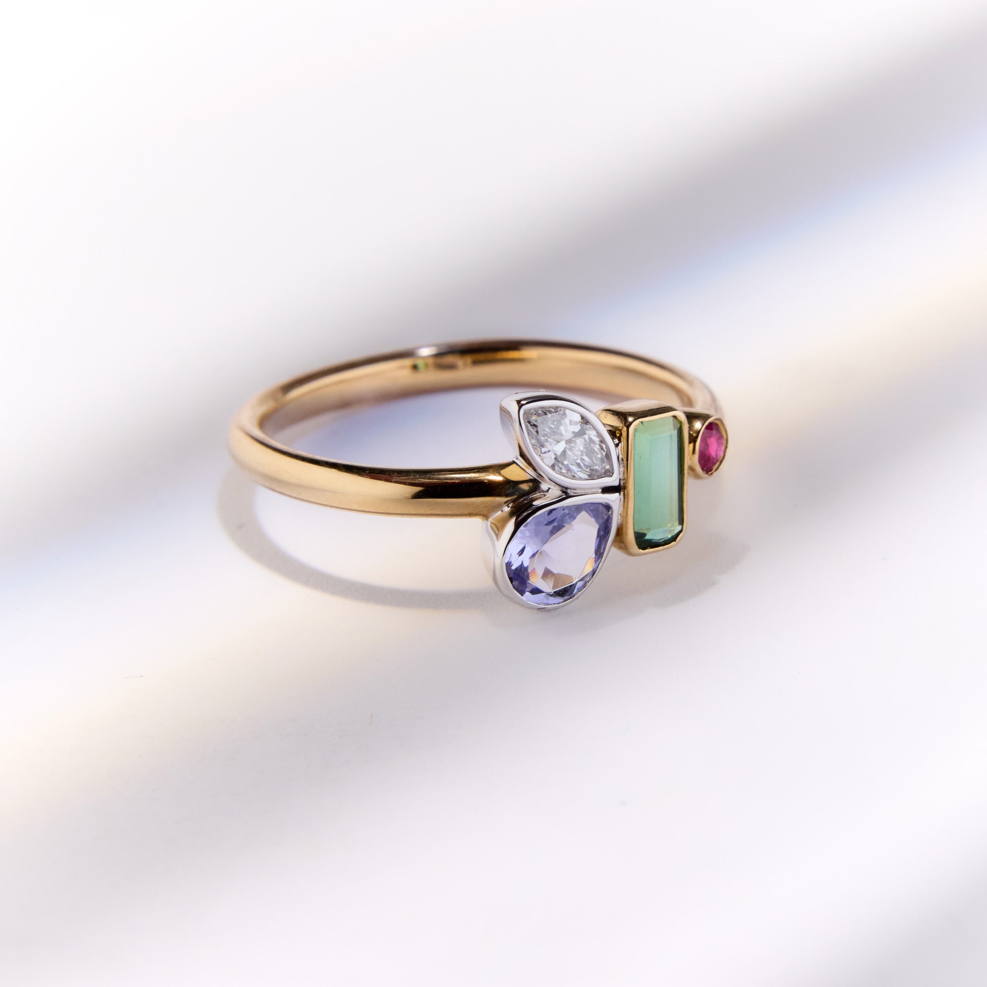 Birthstone bouquet ring with green tourmaline, amethyst, diamond and ruby cluster