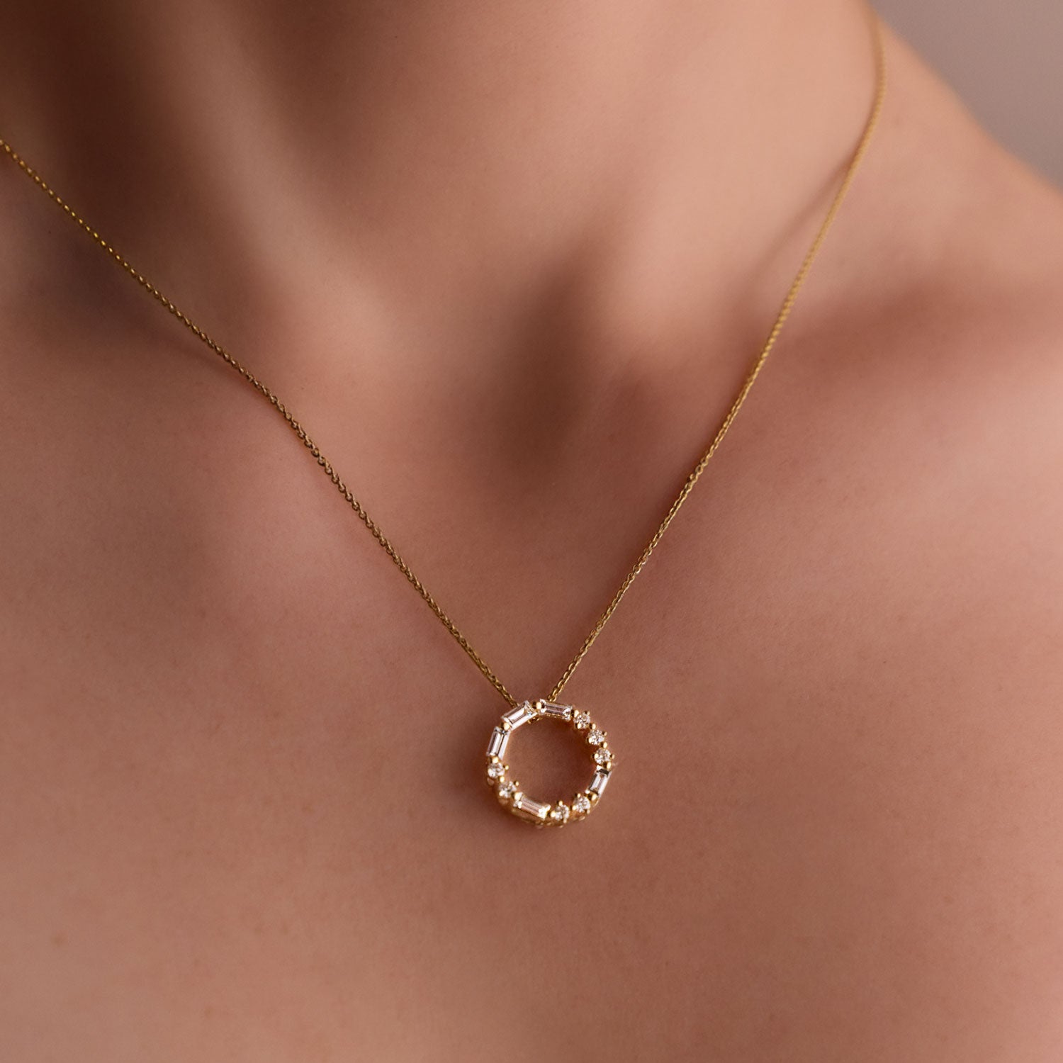 FJ 18k Yellow gold circle pendant with round and baguette diamonds spelling “LOVE” in Morse code.