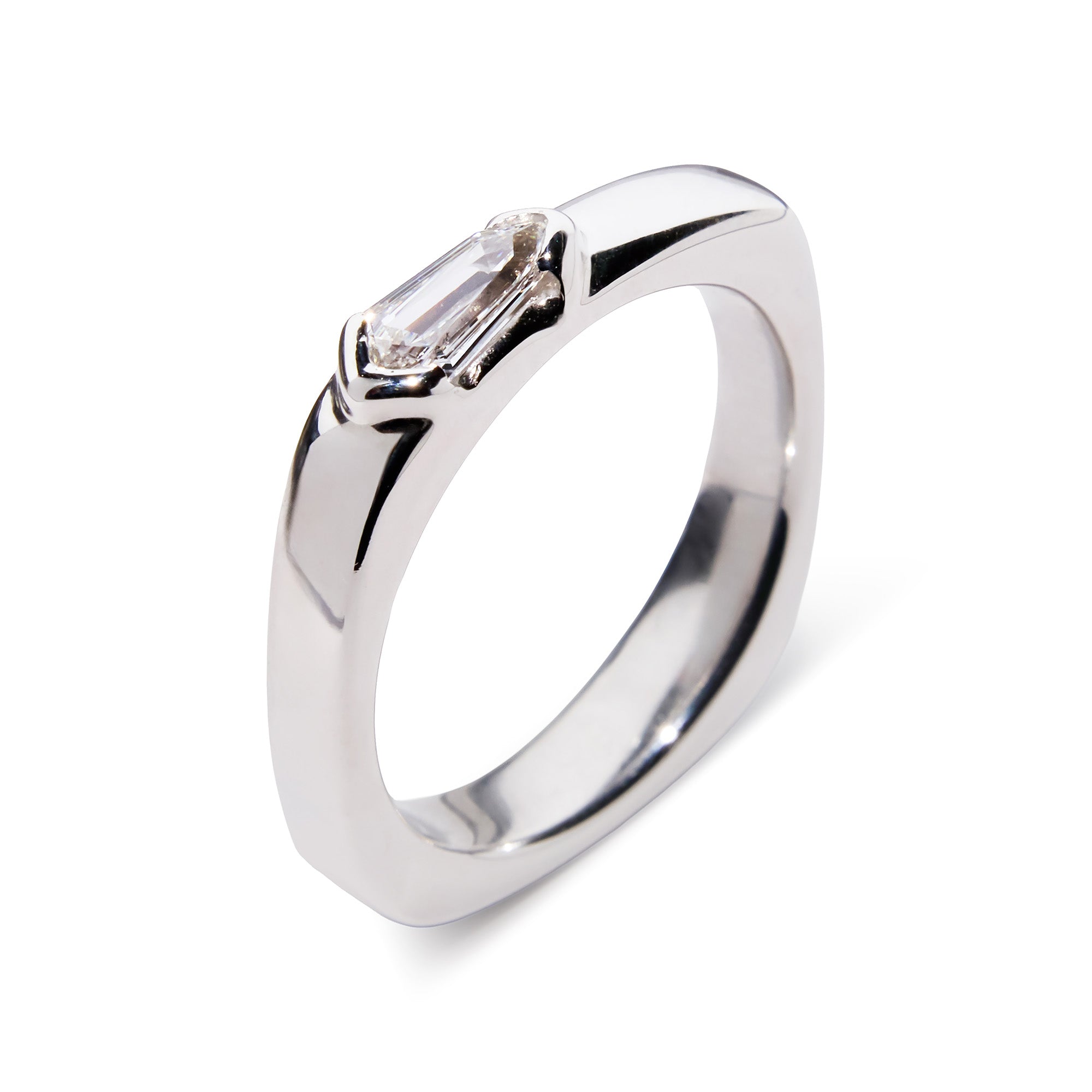 Kite-shaped diamond signet ring in 18k white gold with modern geometric design