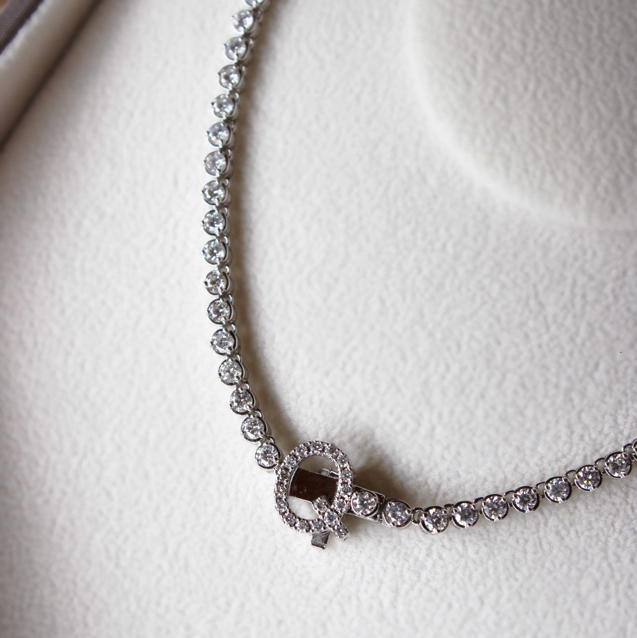 GRADUATED DIAMOND TENNIS NECKLACE WITH INITIAL CLASP - SOLD